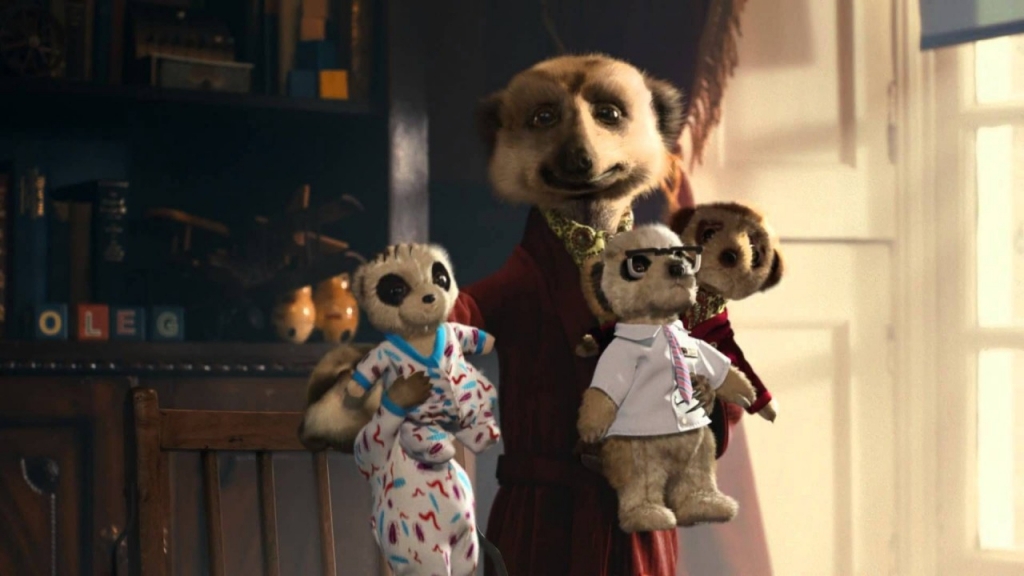 compare the meerkat mascot holding dolls from iconic british advert